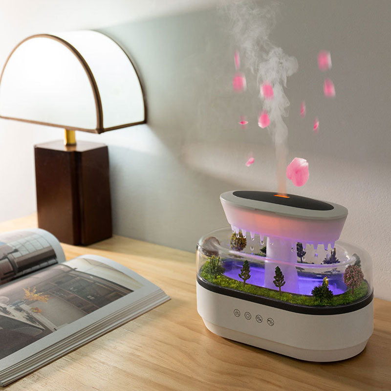 Raindrop - style aroma humidifier with lights, white noise, and essential oil diffusion for home.